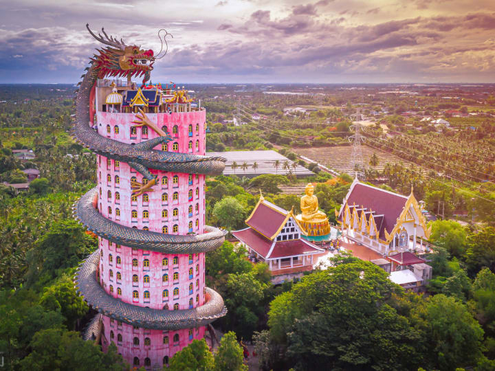 Walk to the top of the Dragon Temple